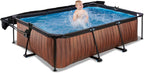 EXIT Toys Wood Pool con Toldo Solar - 220x150x65cm - Piscina de Marco Rectangular Compacta con Bomba de Filtro de Cartucho - Protección UV Óptima - Fácil Acceso - Diseño Único - Marrón